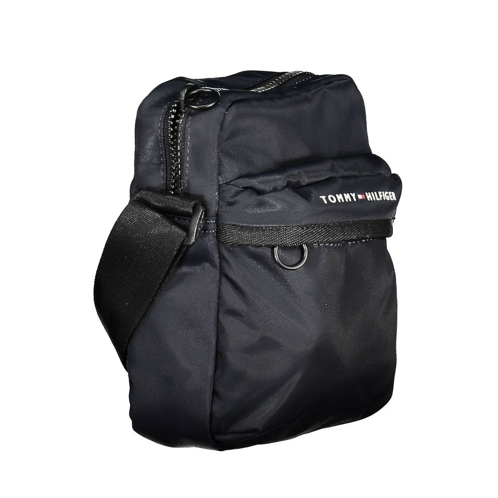 Front view with bag zipped and handles upright.