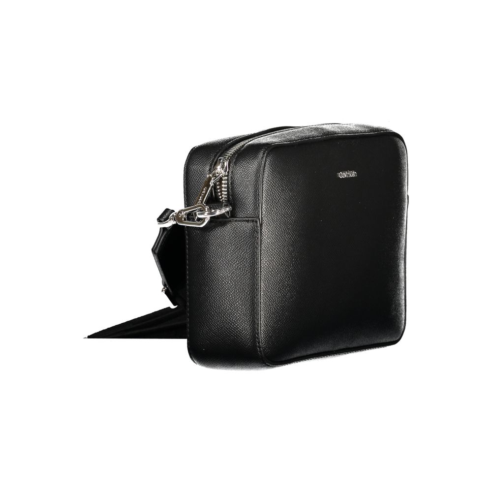 Front view with bag zipped and handles upright.