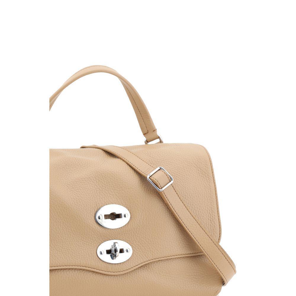 Front view with bag zipped and handles upright.