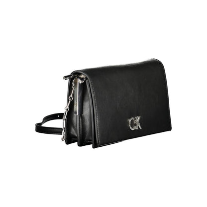 Calvin Klein Black Polyester Handbag with adjustable shoulder strap, compartments, and twist closure, made of 50% recycled polyester.