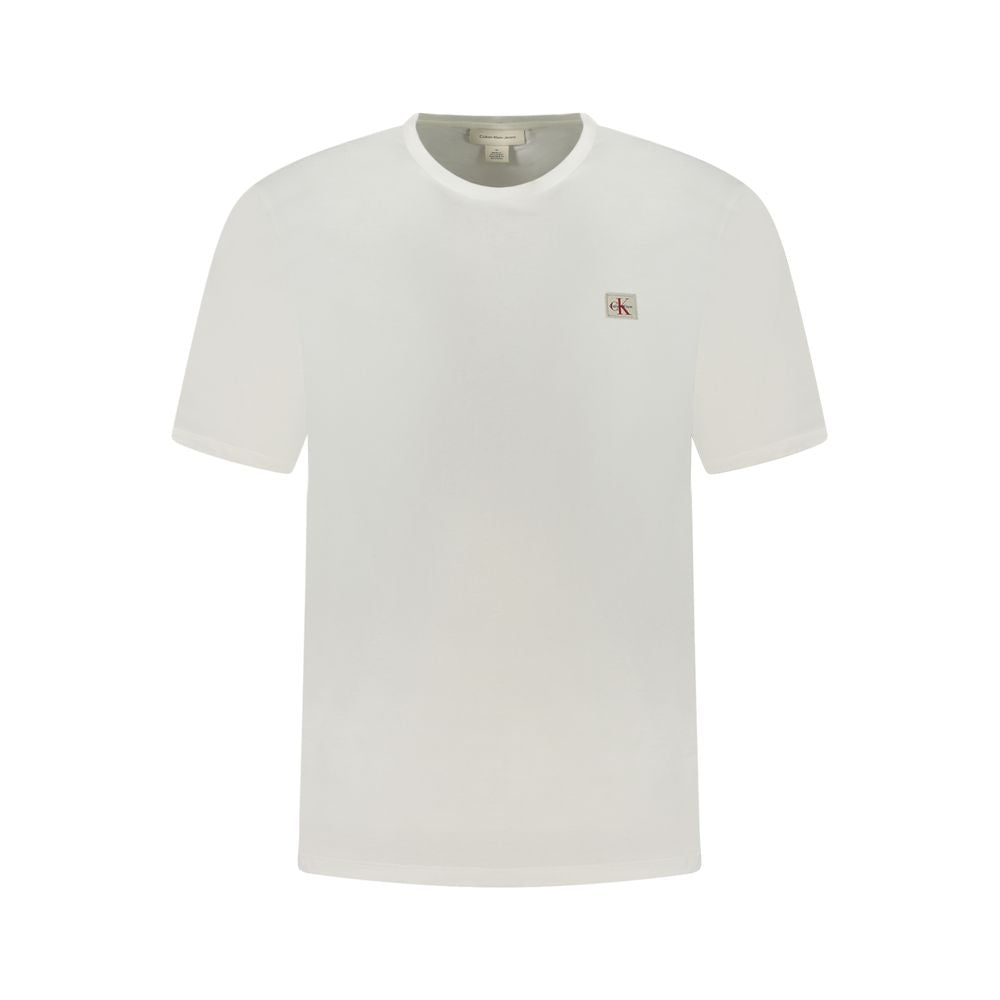 Calvin Klein White Cotton Men T-Shirt with logo appliqué, premium soft cotton fabric, crew neck style for elegant casual wear.