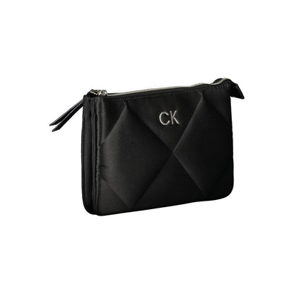 Calvin Klein Black Polyester Handbag with zip closure and logo, featuring adjustable shoulder strap and internal card pocket.