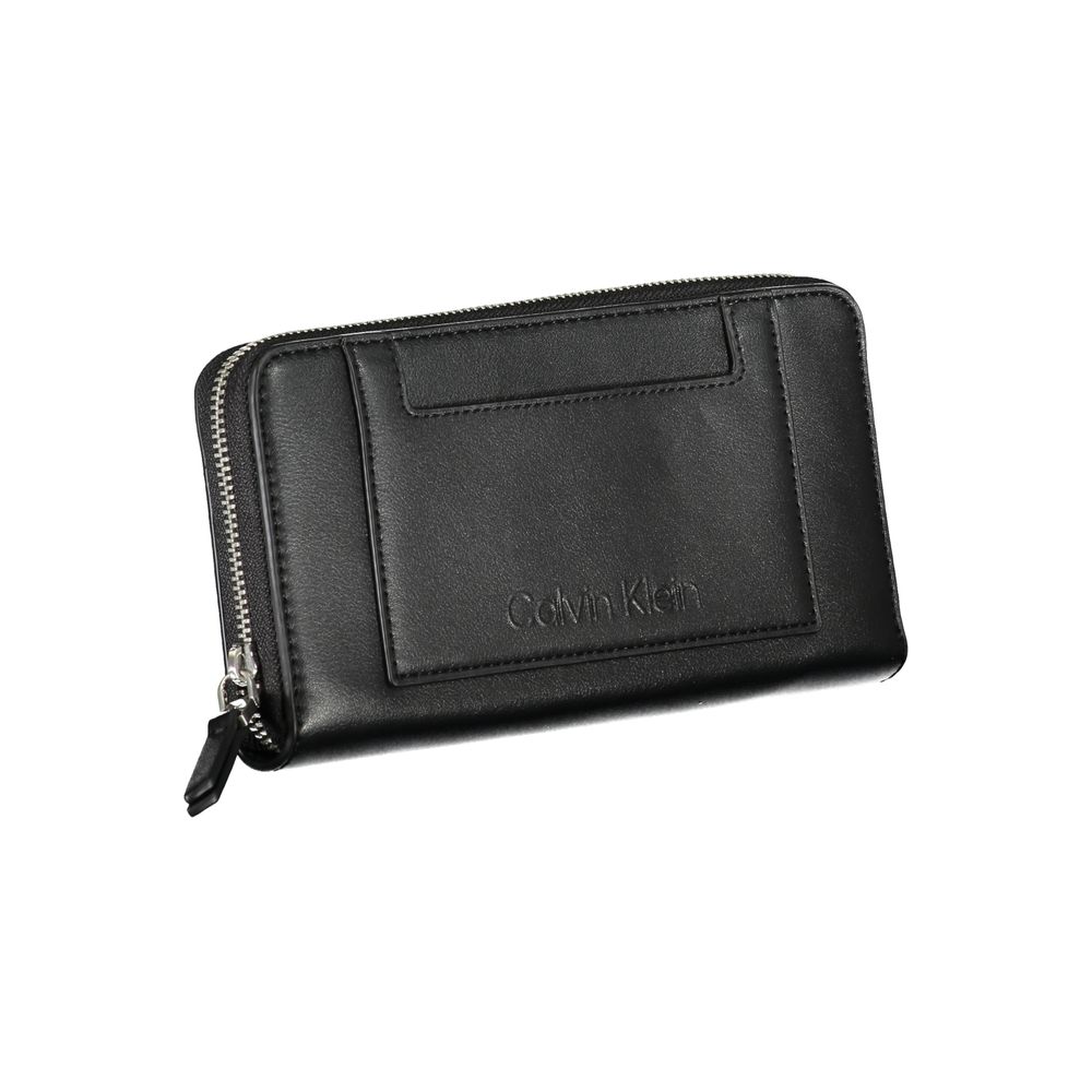 Calvin Klein Black Polyester Wallet with zip closure, contrasting details, and multiple compartments including coin purse and card spaces.