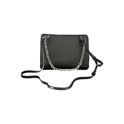 Calvin Klein Black Polyester Handbag with chain handle and adjustable strap, featuring two compartments and a turn closure.