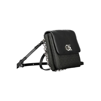 Calvin Klein Black Polyester Handbag with chain handle, adjustable strap, and logo on front, made from 100% recycled polyester.