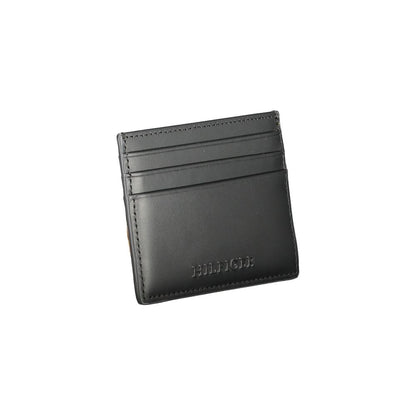 Tommy Hilfiger Black Leather Wallet with card holder, central pocket, card spaces, contrast details, and logo embossing.