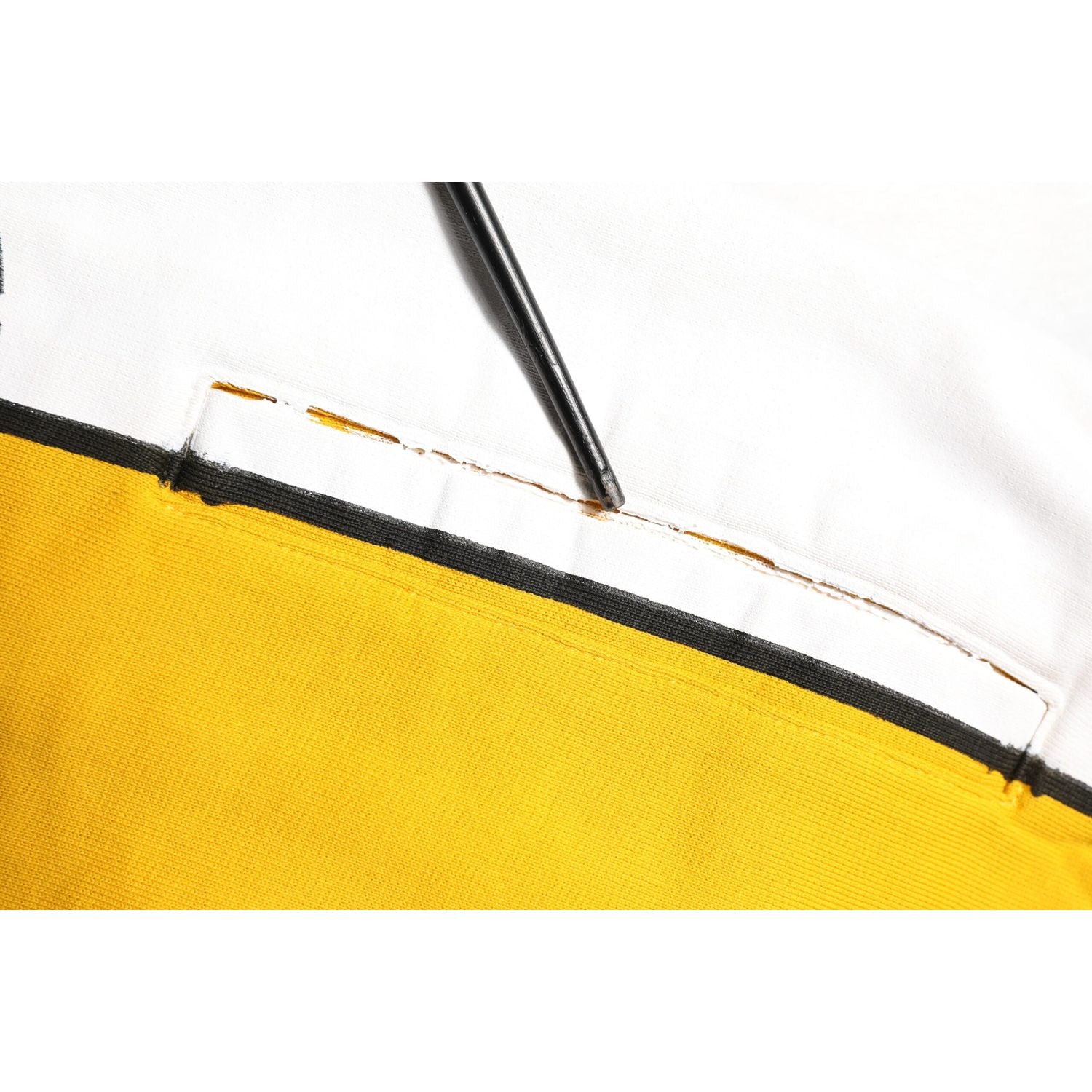 Front view with bag zipped and handles upright.