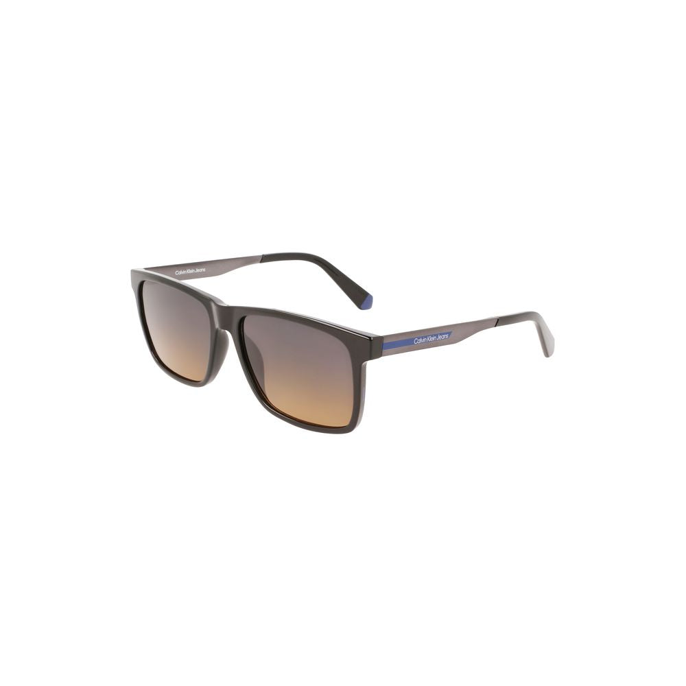 Calvin Klein Black Plastic Men Sunglass with square frame and brown lenses for stylish clarity.