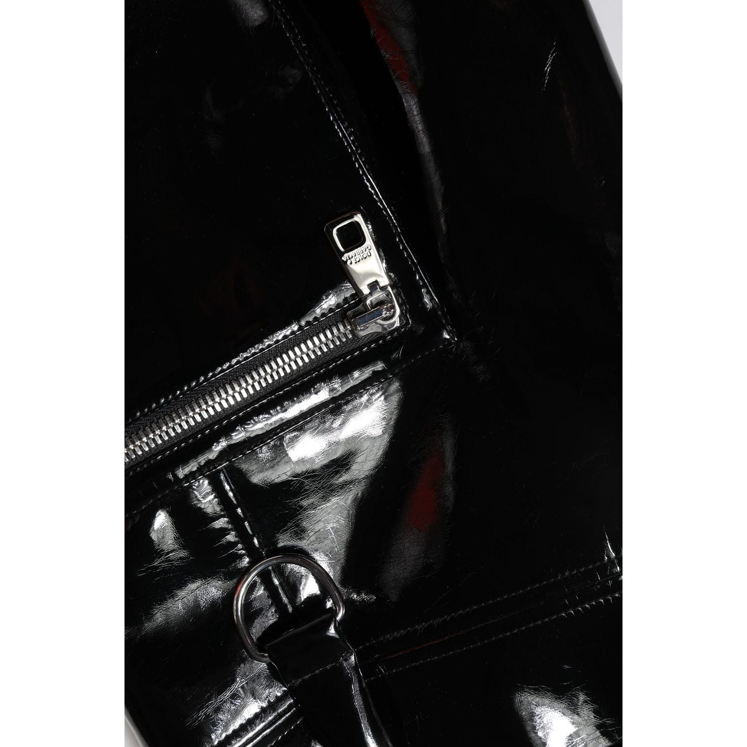 Front view with bag zipped and handles upright.