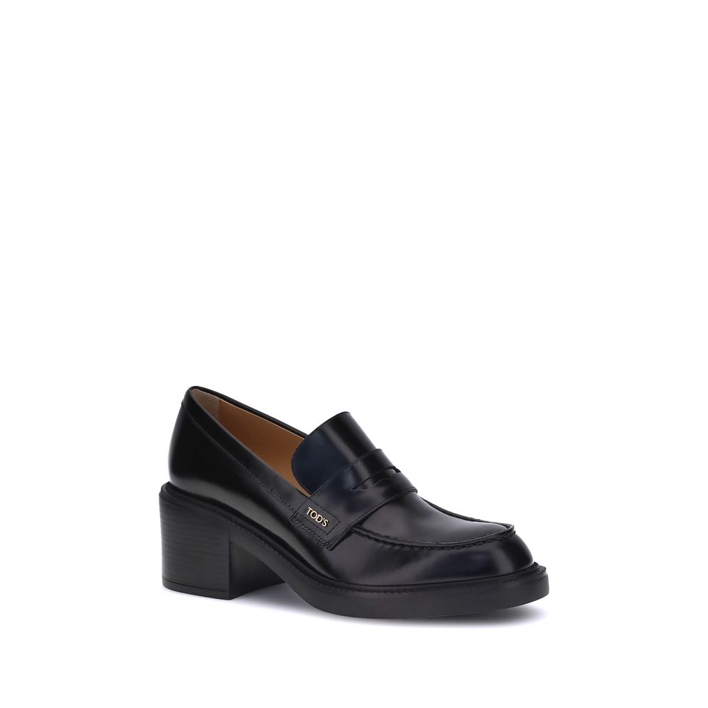 Tod's Black Calf Leather Bos Taurus Platform Loafers with chunky heel and elegant design, ideal for casual and formal looks.