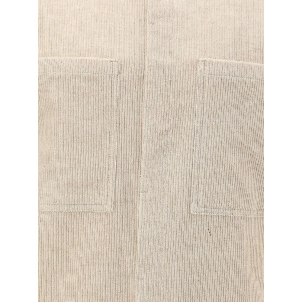 Close-up of a Rick Owens Cream Cotton Shirt showing corduroy texture and front pockets.
