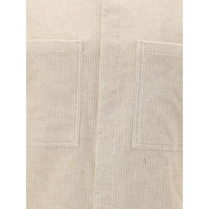 Close-up of a Rick Owens Cream Cotton Shirt showing corduroy texture and front pockets.