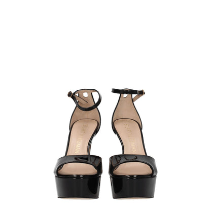 Stuart Weitzman Black Leather Platform Sandals with gold buckle and high heel, patent leather, open toe design, and 14 cm heel.