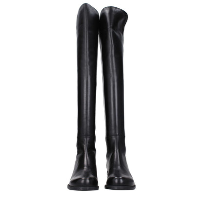 Stuart Weitzman Black Leather Over The Knee boots with vintage effect, featuring a round toe and flat heel, crafted from fine leather.