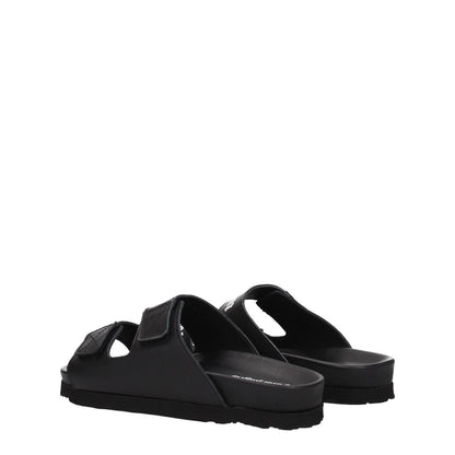 Palm Angels Black Leather Flat Sandals with front logo and strap closure, low rubber heel.
