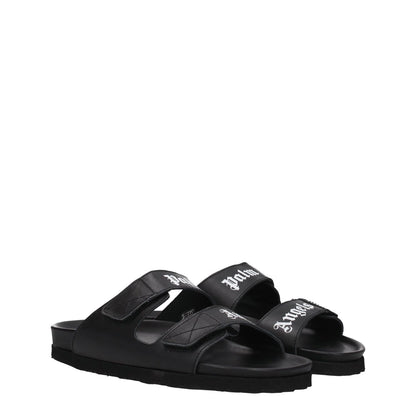 Palm Angels Black Leather Slippers with open toe and logo on strap closure, featuring a low heel and rubber sole for casual style.