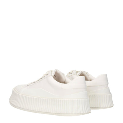 Jil Sander White Fabric Platform Sneakers with wedge heel, lace-up closure, and rubber sole. Casual style and round toe design.