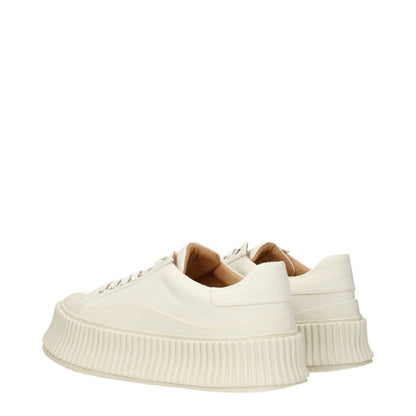 Jil Sander White Fabric Platform Sneakers with aged effect, lace-up closure, rubber sole, and 5 cm wedge heel, side view.