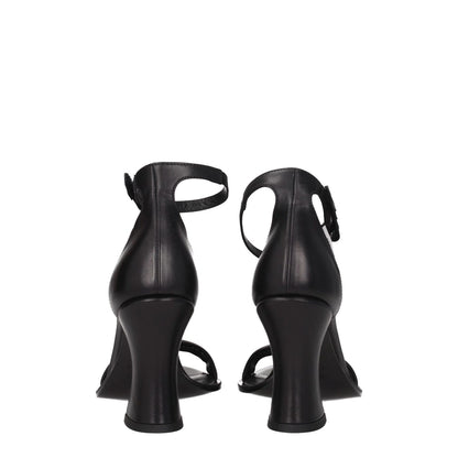 Premiata Black Leather Flat Sandals with high heels and buckle closure, featuring a side logo, designed for a casual style.