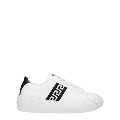 Versace White Leather Low Top Sneakers with lace-up closure, rubber sole, and black accents for a casual style.