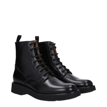 Church's Black Leather Ankle Boots with lace-up closure, rubber sole, and round toe design, featuring aged and vintage effects.