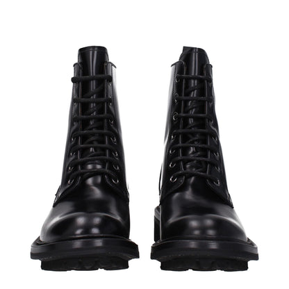 Church's Black Leather Ankle Boots with lace-up closure and round toe, featuring a vintage effect and low flat heel.