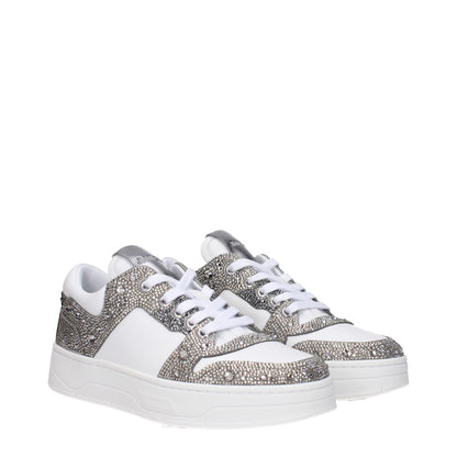 Jimmy Choo White Leather Chunky Sneakers with rhinestone details, lace-up closure, rubber sole, and silver accents.