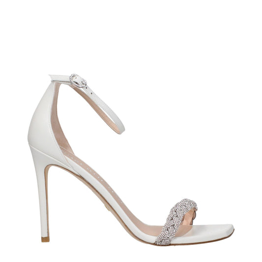 Alt Tag: Stuart Weitzman White Leather Stiletto Heel Sandals with rhinestone detail and buckle closure, high heel, open toe design.
