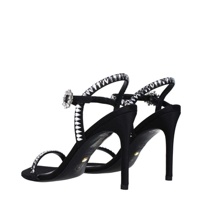 Stuart Weitzman Black Satin Stiletto Heel Sandals with rhinestone accents and buckle closure, high heel, open toe design.