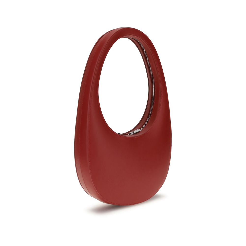 Coperni Red Calf Leather Bos Taurus Shoulder Bag with unique hobo silhouette and three-dimensional monogram plaque.