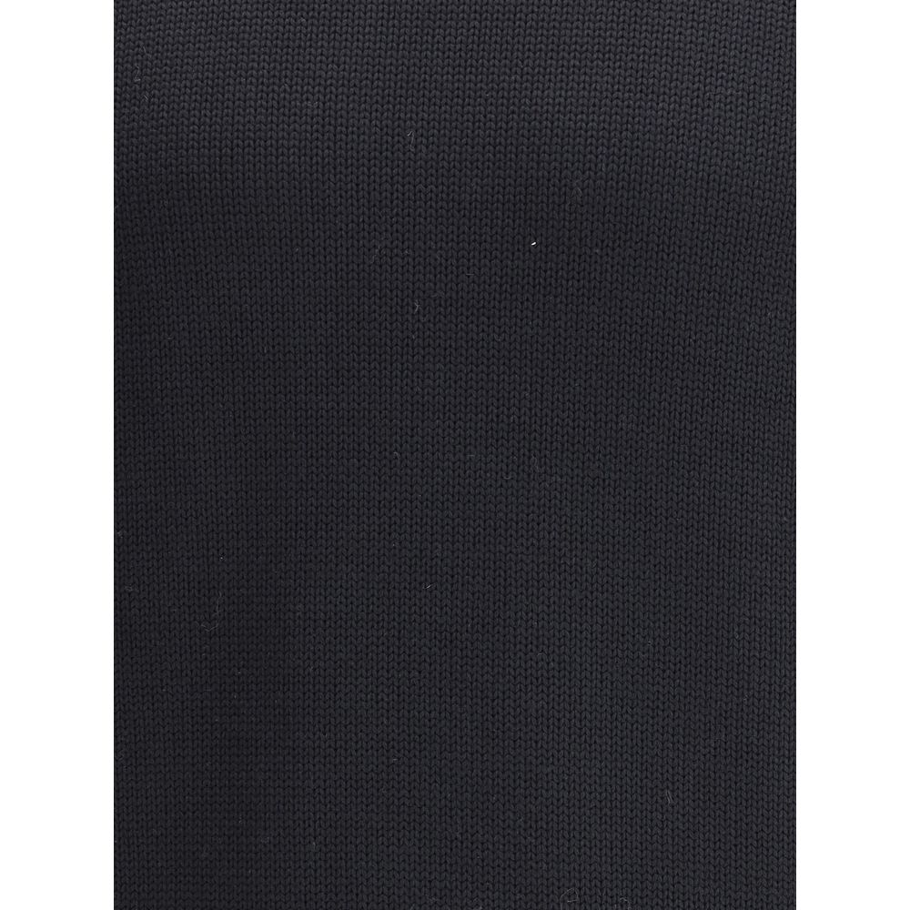 Textured fabric swatch of Roberto Collina Black Merino Wool Turtleneck showcasing ribbed material for refined elegance.