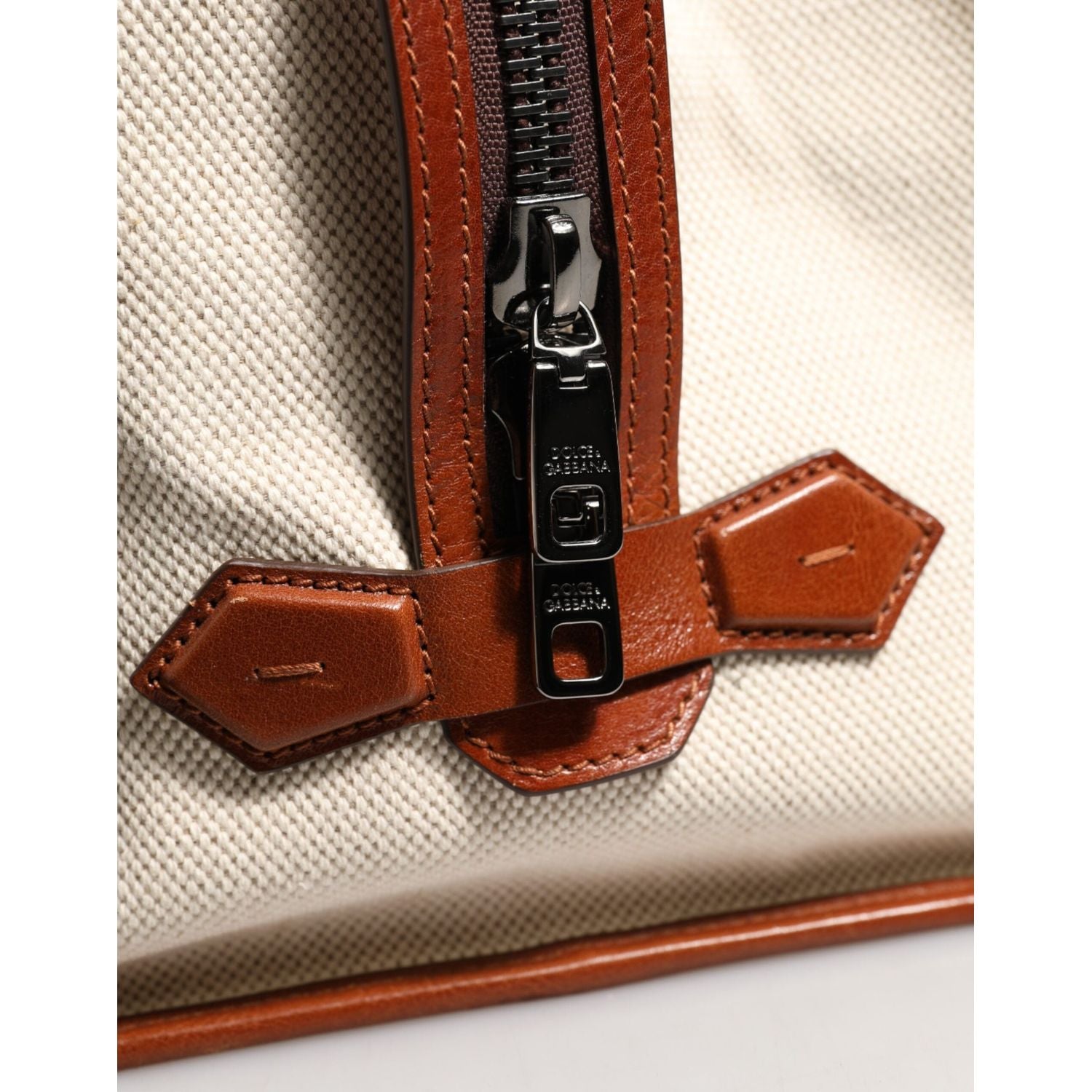 Front view with bag zipped and handles upright.
