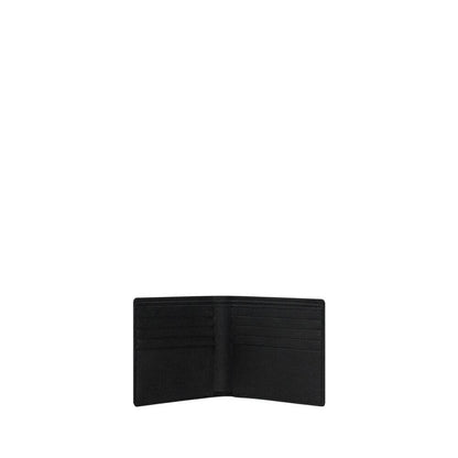 Saint Laurent Black Calf Leather Bos Taurus Wallet with billfold design and interior card slots, grained texture, and brand signature.