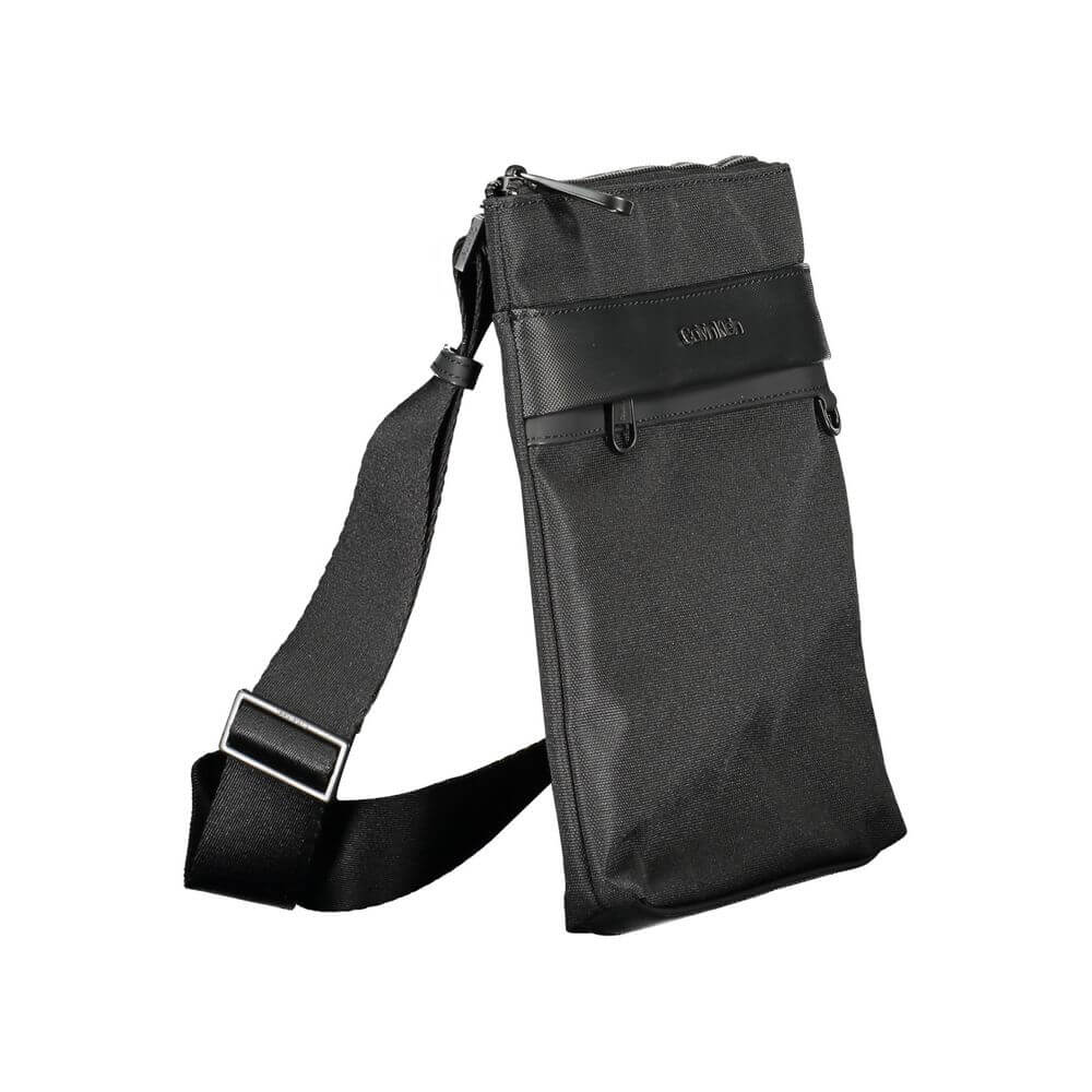 Calvin Klein Black Polyester Shoulder Bag with adjustable strap, external and internal pockets, contrasting details, and zip closure.