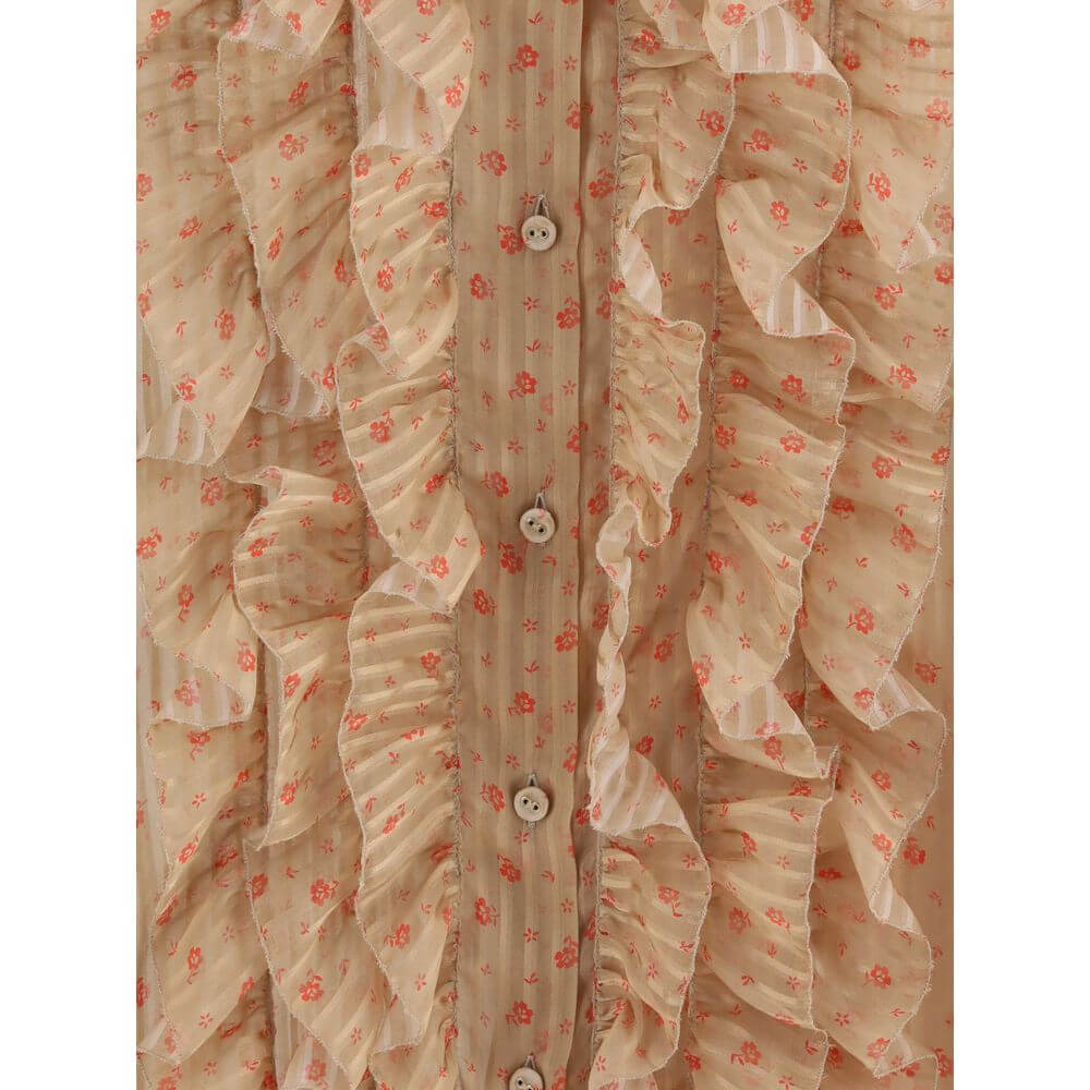 Close-up of Kristina Ti Multicolor Silk Blouse with ruffles, floral pattern, and button closure, showcasing elegant and romantic design.