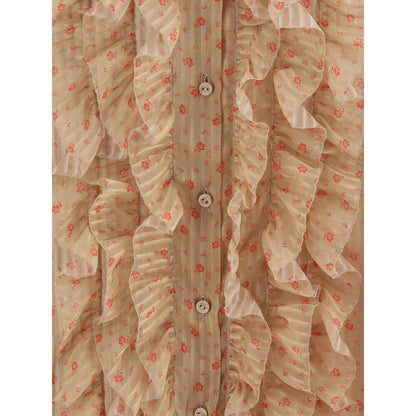 Close-up of Kristina Ti Multicolor Silk Blouse with ruffles, floral pattern, and button closure, showcasing elegant and romantic design.