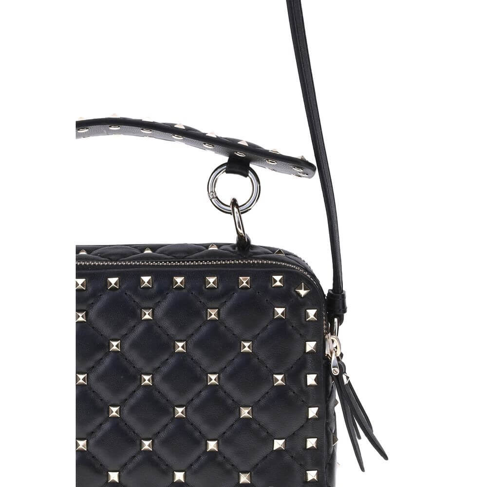 Valentino Garavani Black Lamb Ovis Aries Aries Shoulder Bag with gold Rockstuds and quilted design, showcasing handle and strap details.