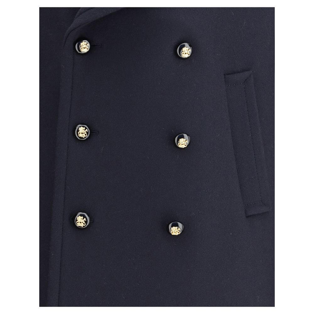 Close-up of Valentino Blue Fleece Wool Coat showing double-breasted button detail and pocket