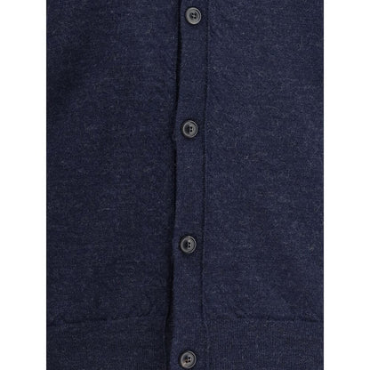 Close-up of Margiela Blue Wool Cardigan showing front button closure and texture, emphasizing classic elegance and timeless style.