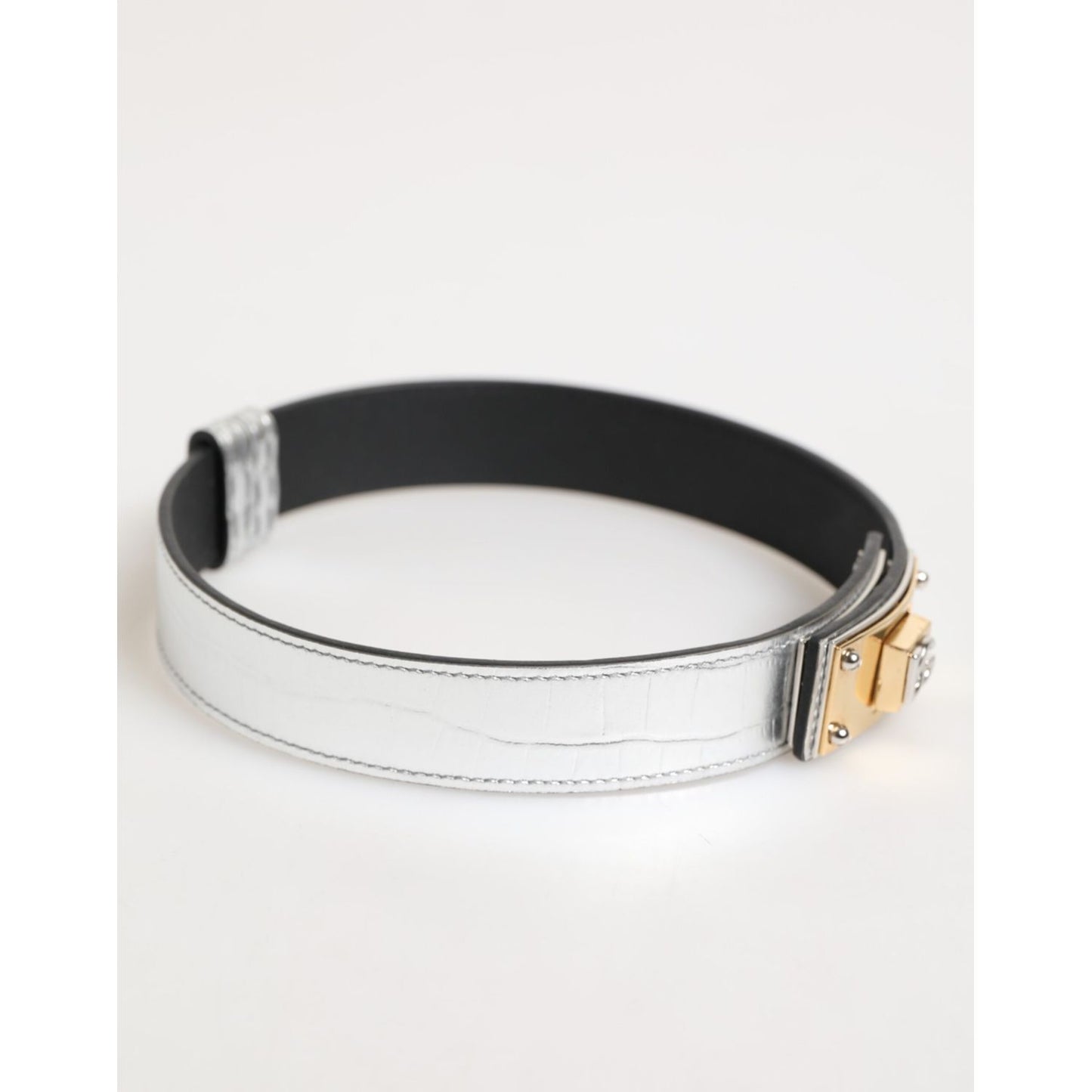 Dolce & Gabbana Silver Textured Leather Gold Tone Metal Neckband with engraved logo and adjustable buckle closure, elegant modern design.