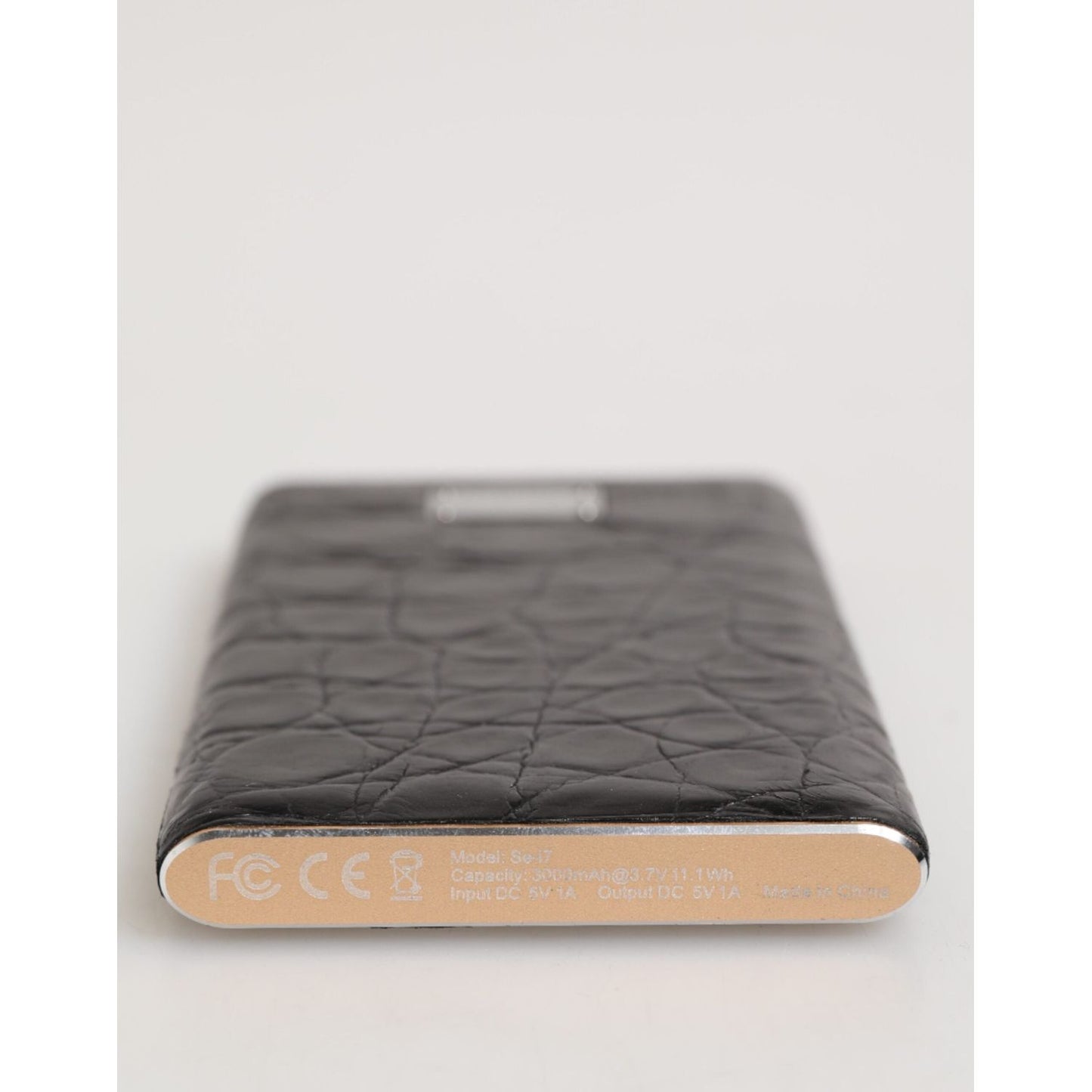 Dolce & Gabbana Black Leather Exotic Skin 3000mAh Power Bank Charger USB with luxurious texture showcased