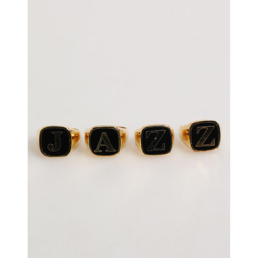 Dolce & Gabbana Gold Tone Brass JAZZ Letter Set 4 Pieces Adjustable Ring, luxury statement rings for music lovers.