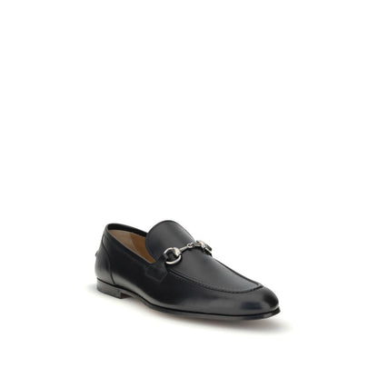 Gucci Black Calf Leather Bos Taurus Slip-On Loafers with metallic Morsetto detail, elegant round toe.