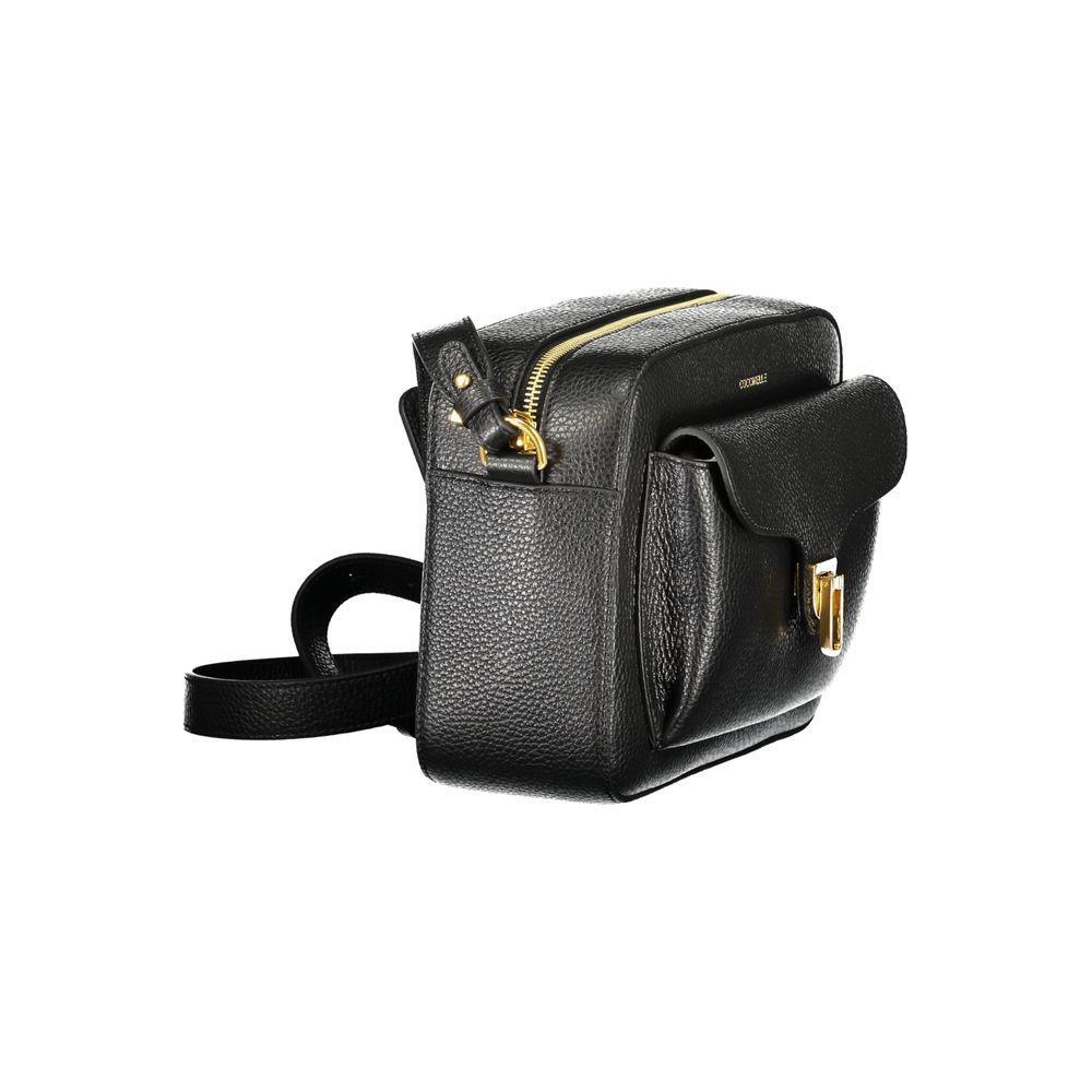 Front view with bag zipped and handles upright.