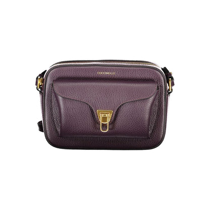 Coccinelle Purple Leather Women Handbag with gold twist closure and adjustable strap, showcasing Italian craftsmanship.