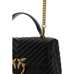 Close-up of PINKO Love Lady Handbag with gold-plated Love Birds logo, quilted design, and chain strap.