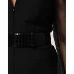 Close-up of Emporio Armani Black Sheer Sleeve Belted V-Neck Mini Dress, featuring a square patterned belt and sheer long sleeve detail.
