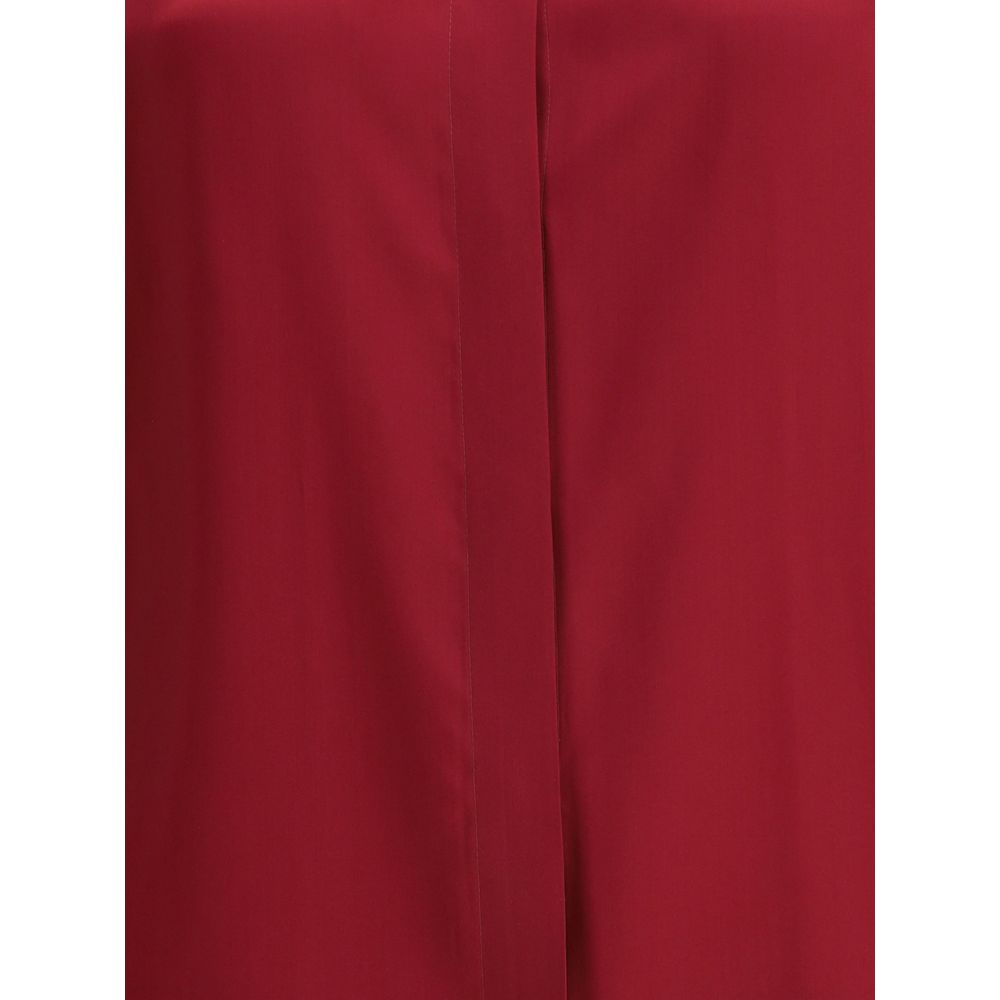 Close-up view of Crida Milano Multicolor Silk Shirt with smooth satin texture, showcasing its luminous and sophisticated red fabric.