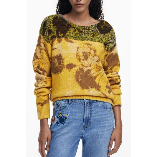 Desigual Yellow Wool Women Sweater with floral pattern, long sleeves, crew neck, stylish look, worn by model with embroidered jeans.
