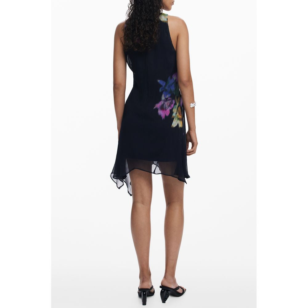 Back view of model wearing Desigual Black Polyester Women Dress with bold floral print and sleeveless design.